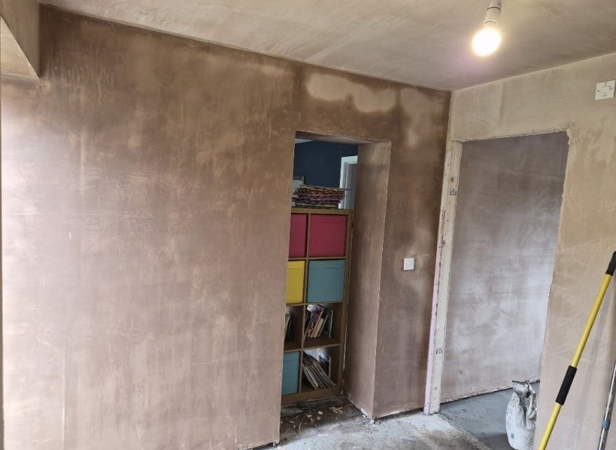 Freshly plastered walls in a Birmingham garage conversion by DJF Building