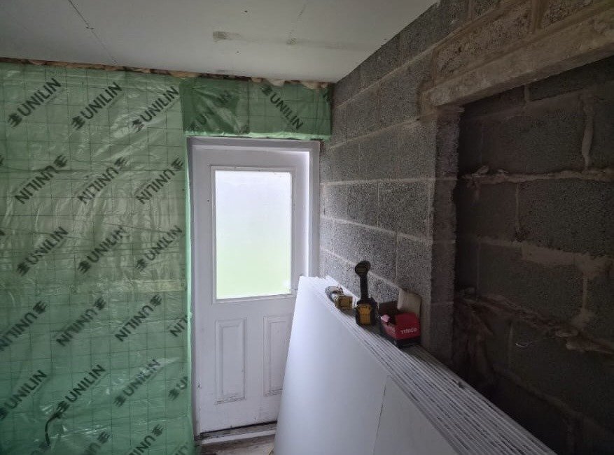 Insulation membrane and new rear door during a Sutton Coldfield garage conversion