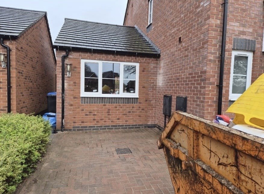 Garage door replaced with a new window on a West Midlands garage conversion